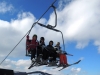All smiles on the lifts in Zakopane! White Side Holidays Poland showing guests around the slopes